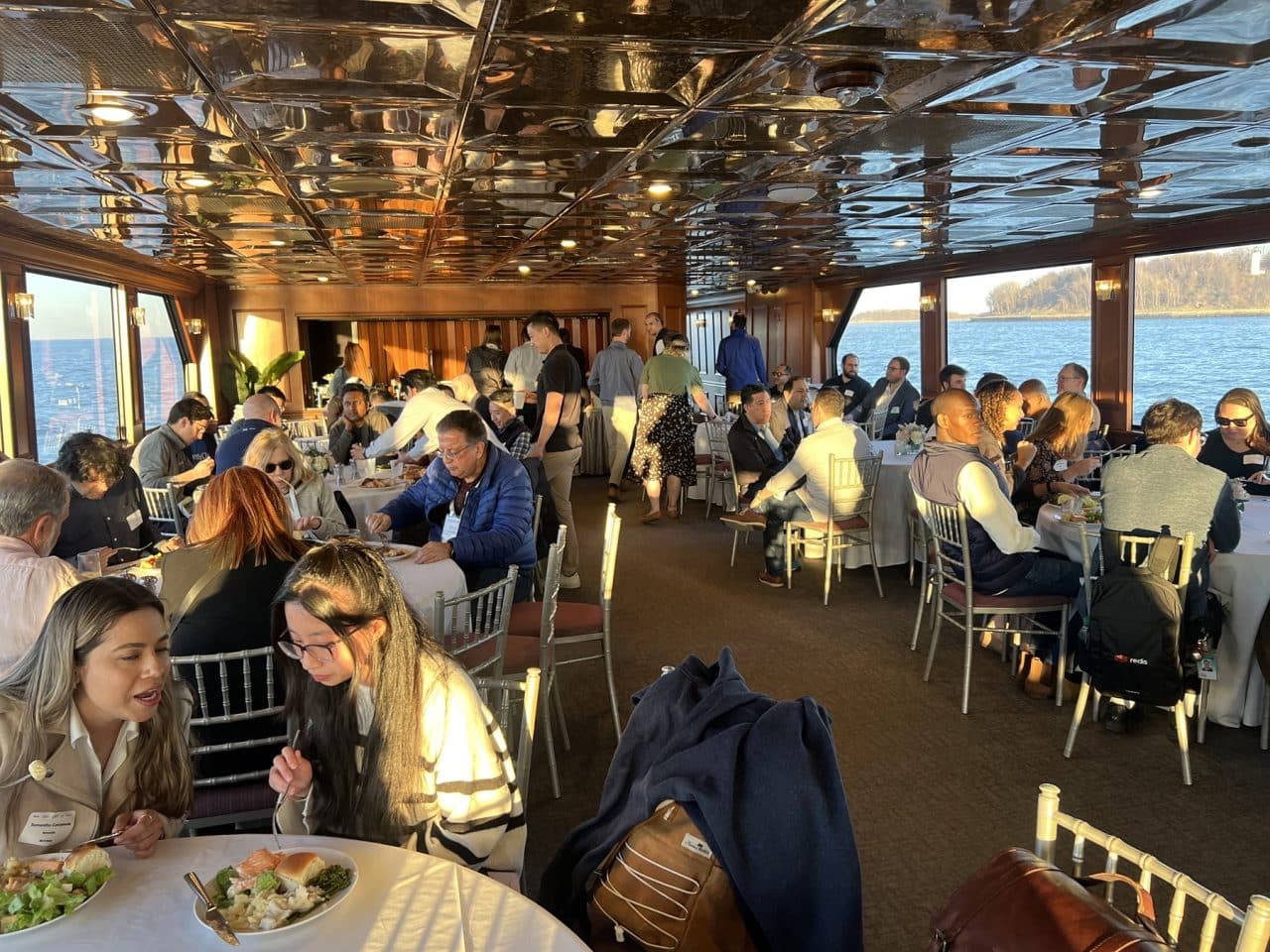 Dining room setup during the Bio-IT Harbor Cruise Networking Event.