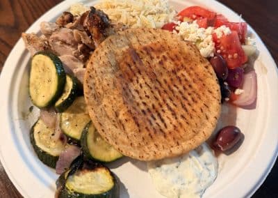 Plate of homemade Greek dinner served by PTP volunteers at American Cancer Society Hope Lodge in Boston
